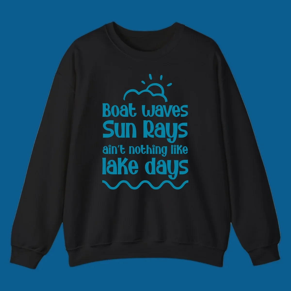 Teal text 'Boat waves Sun rays ain't nothing like lake days' with sun, cloud, and wavy line graphics, representing lake days.
