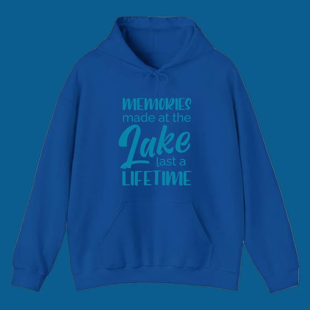 Typography design with the phrase "Memories made at the Lake last a Lifetime" in teal.