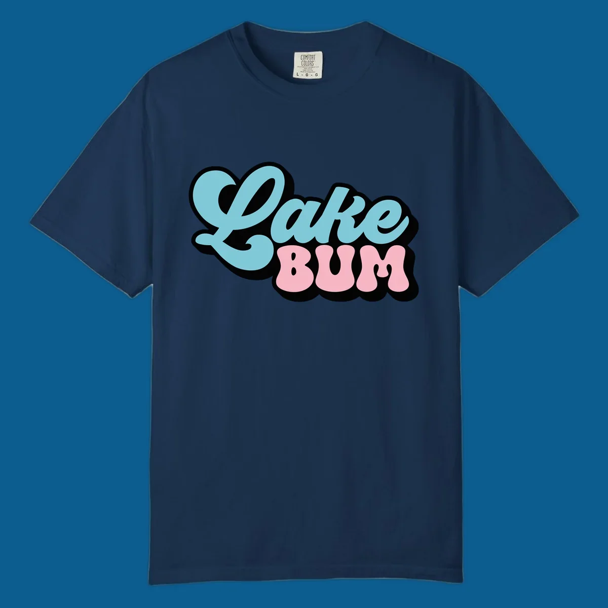 Retro script text design with 'Lake' in light blue and 'BUM' in pink, on a black background. Lake bum style.