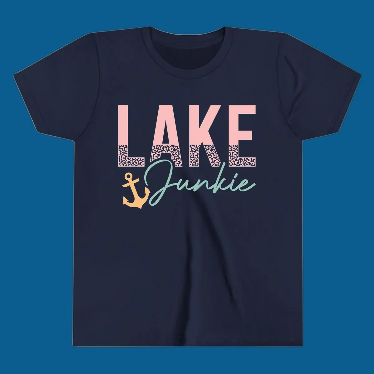 Lake Junkie text with anchor and leopard print, lake-life apparel graphic.