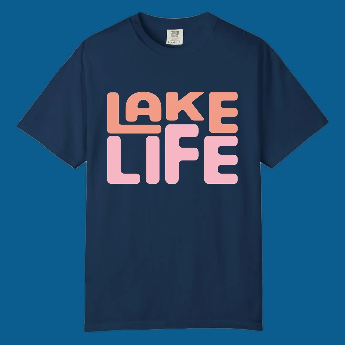 Bold typography design spelling LAKE LIFE in peach and pink.