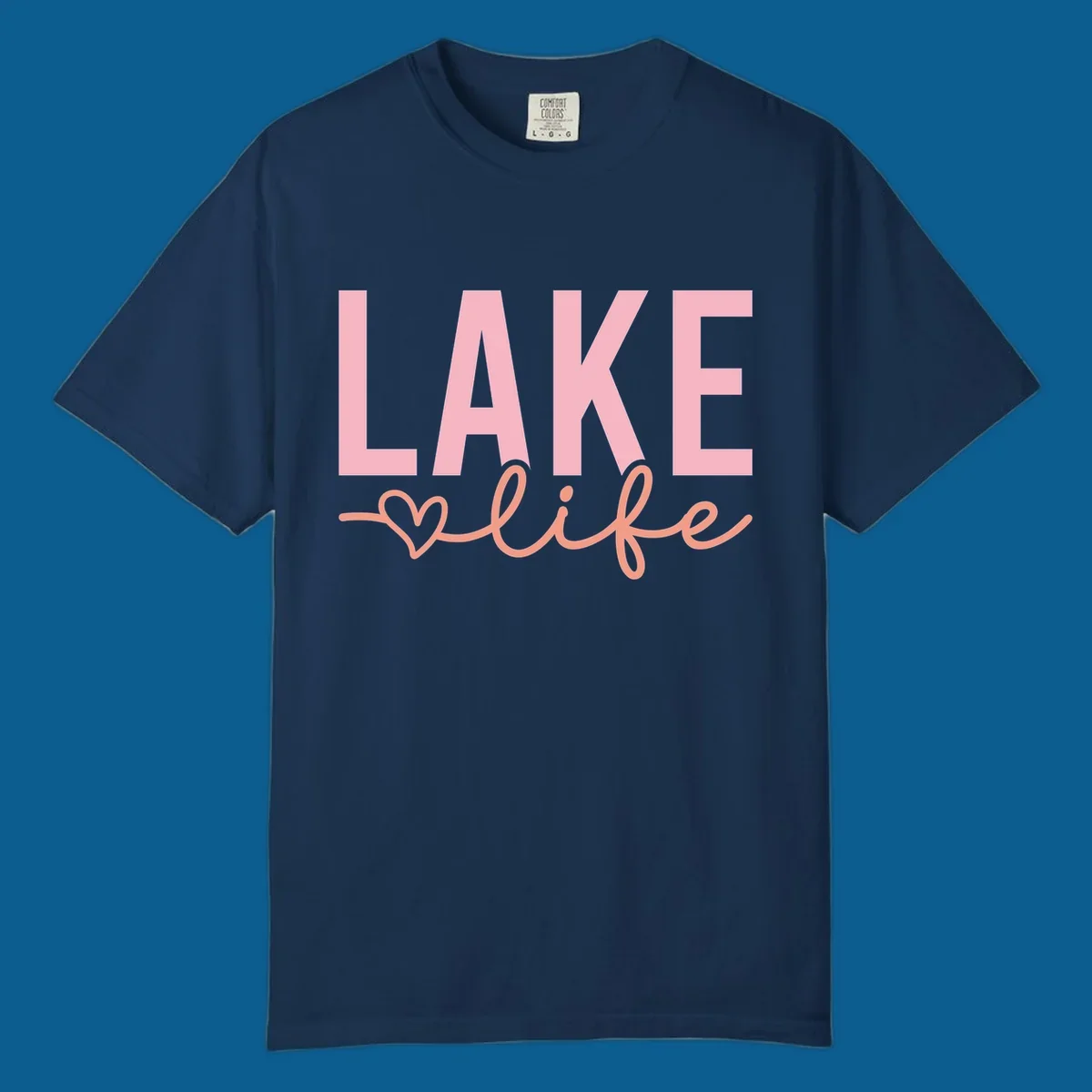 Lake life script design with pink letters and peach cursive text with a heart. lake-life-script