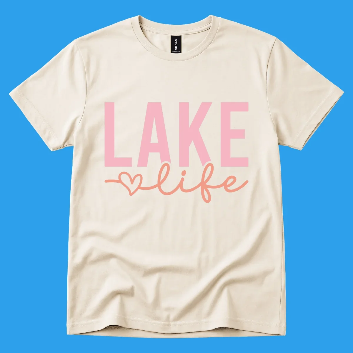Lake life script design with pink letters and peach cursive text with a heart. lake-life-script
