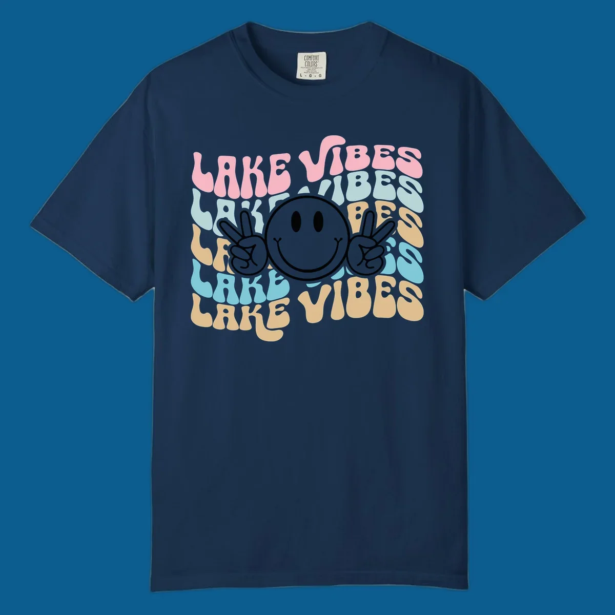 Retro lake vibes text with a black smiley face and peace signs.