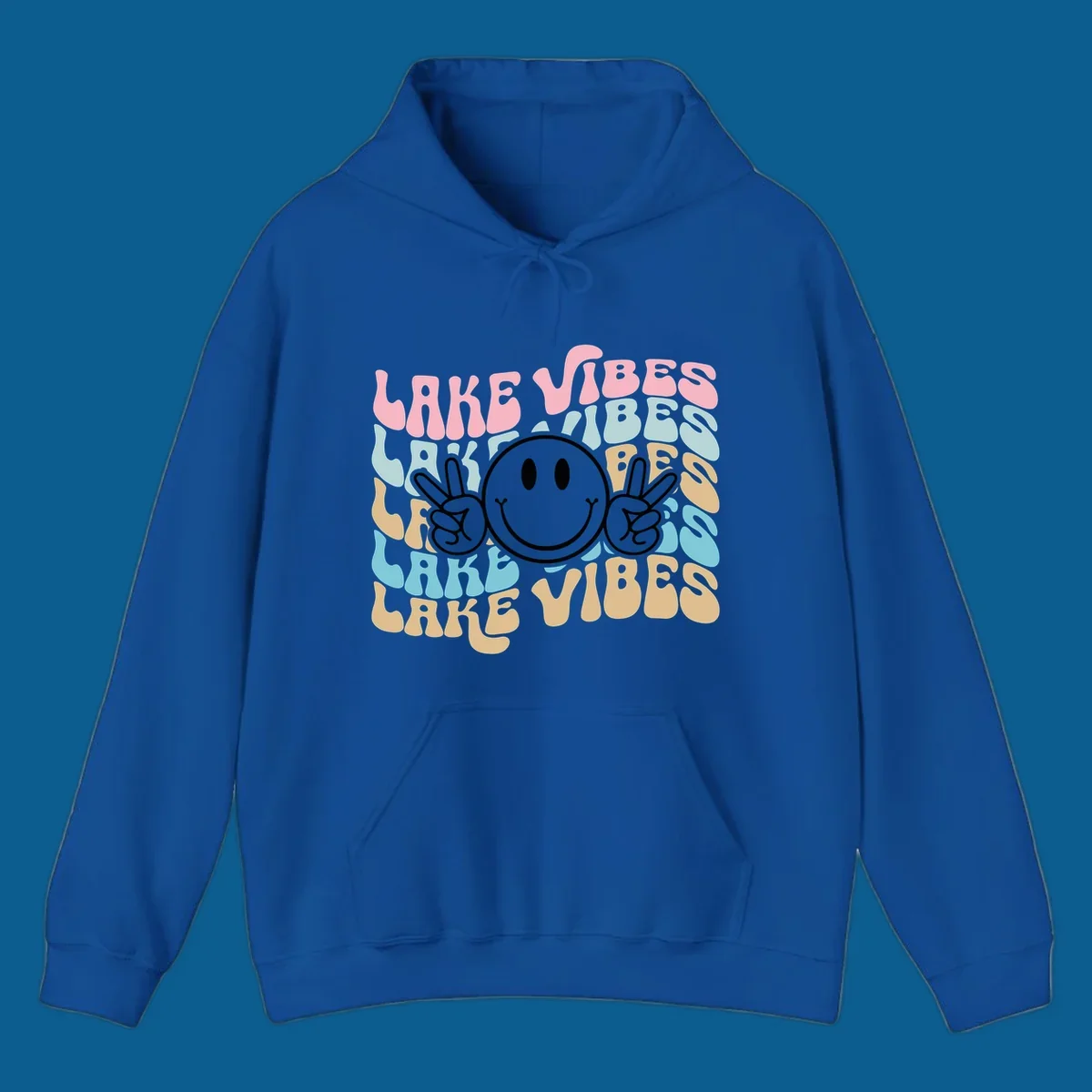 Retro lake vibes text with a black smiley face and peace signs.