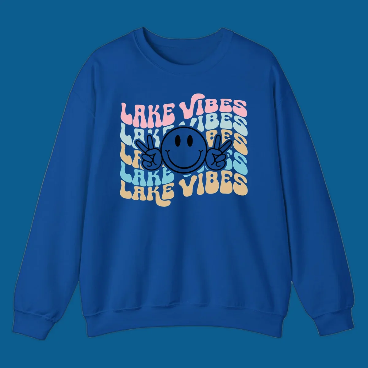 Retro lake vibes text with a black smiley face and peace signs.
