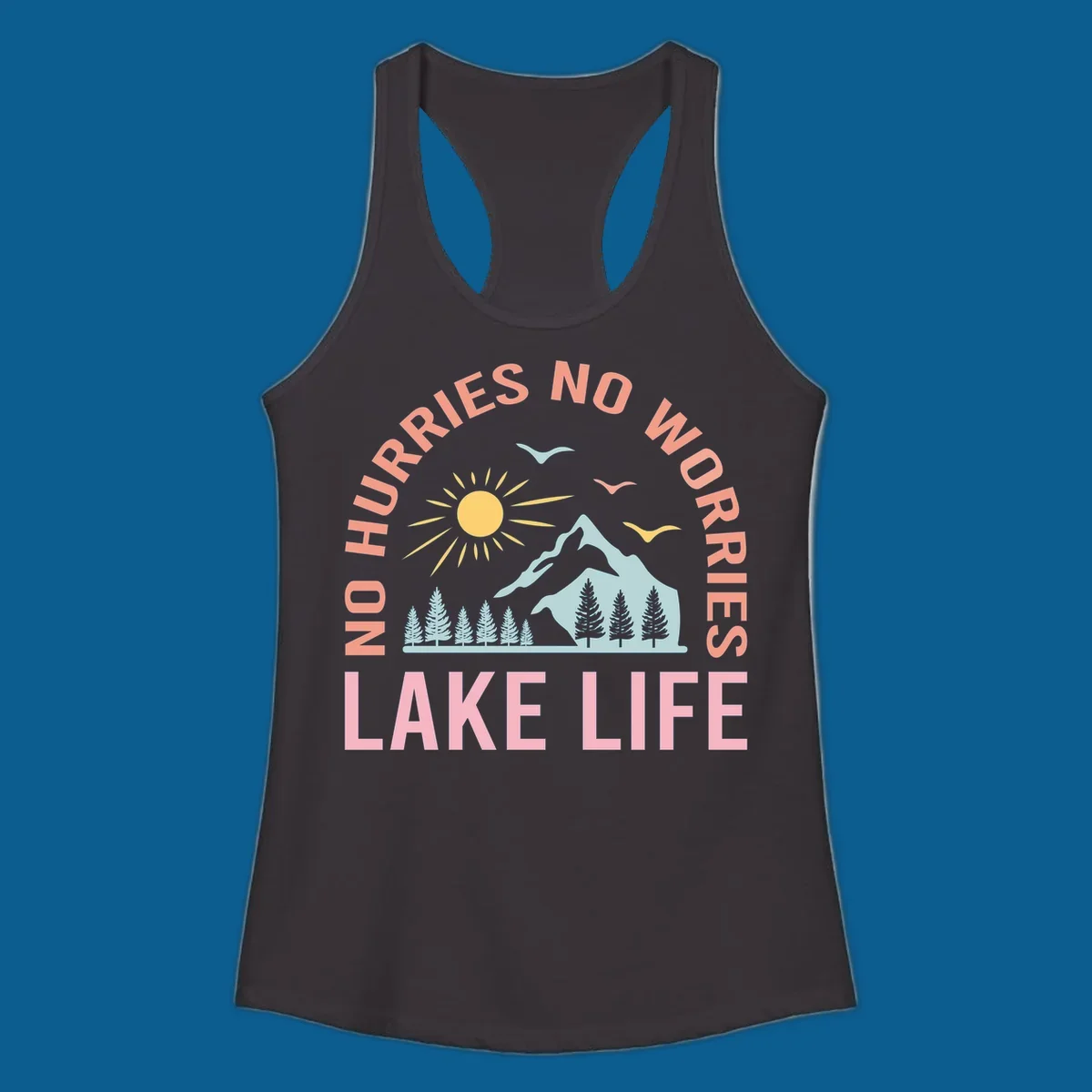 Lake life scenic design with mountains, sun, trees, and no worries text.