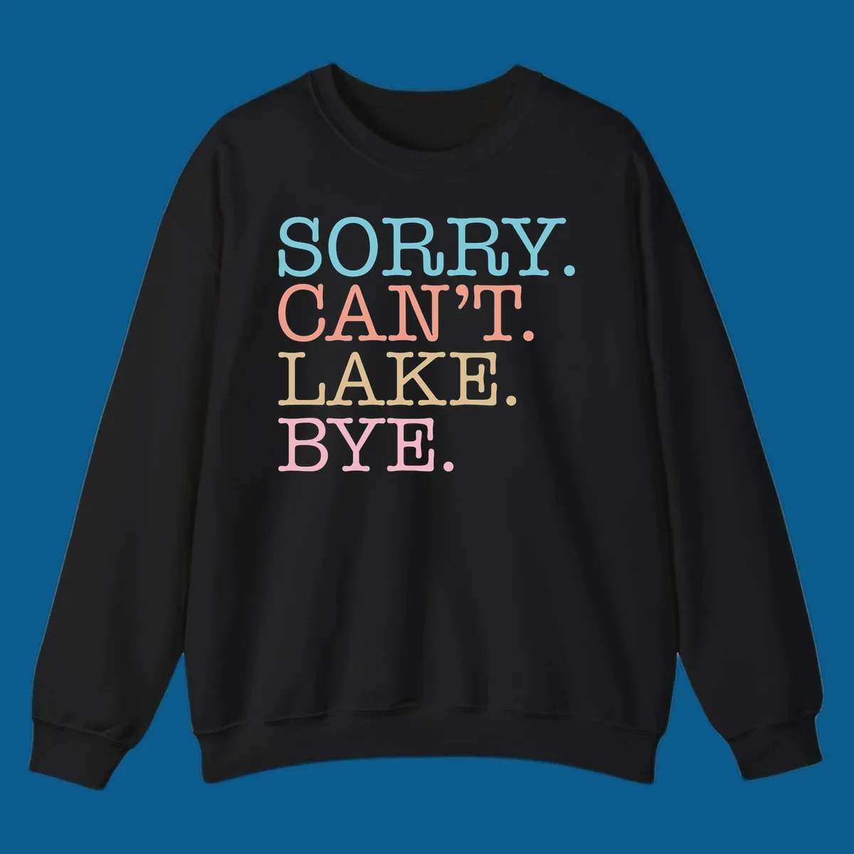 Stacked text design with SORRY. CAN'T. LAKE. BYE. in pastel colors, on a dark background.