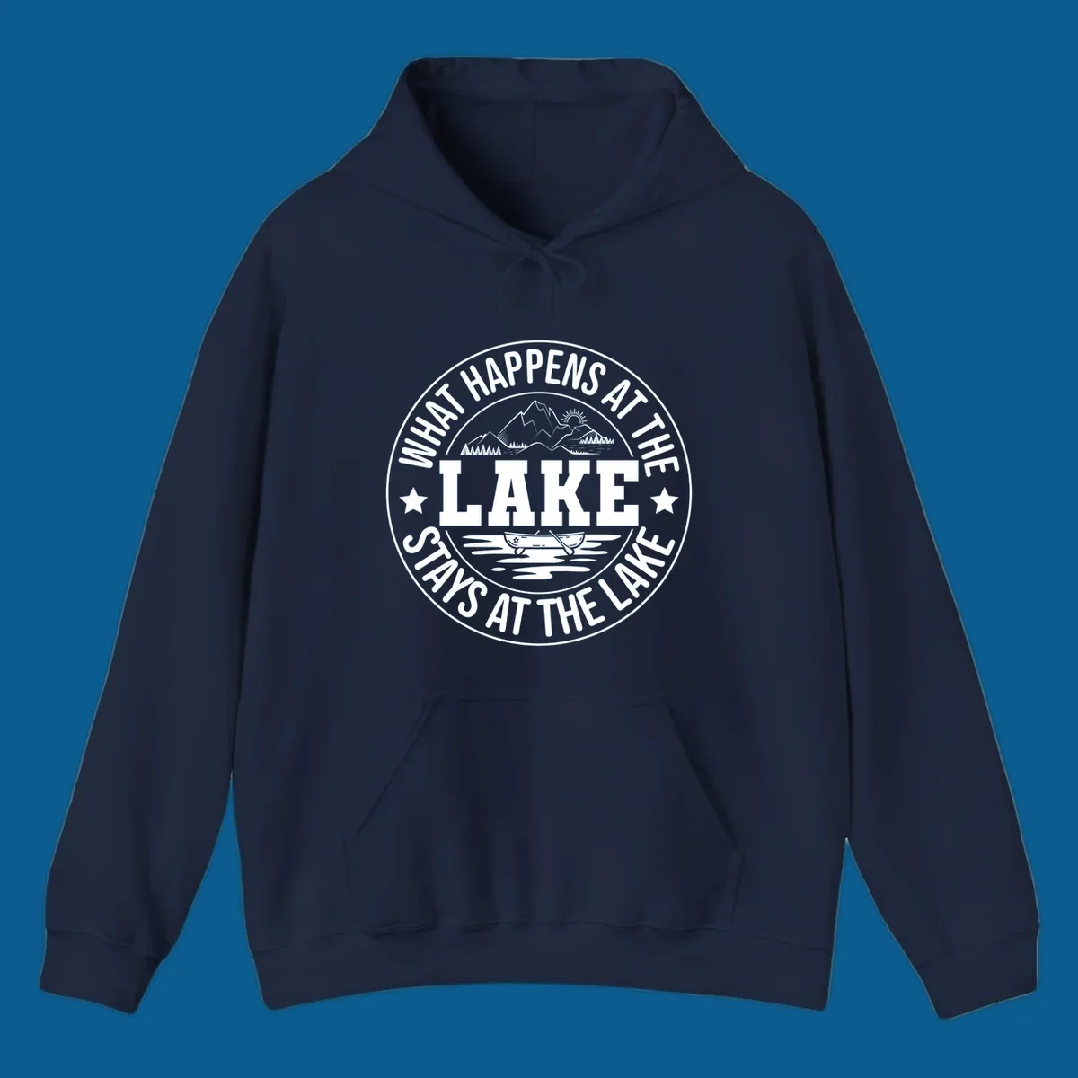 Circular badge with text 'What Happens At The Lake Stays At The Lake' and lake scene graphic.