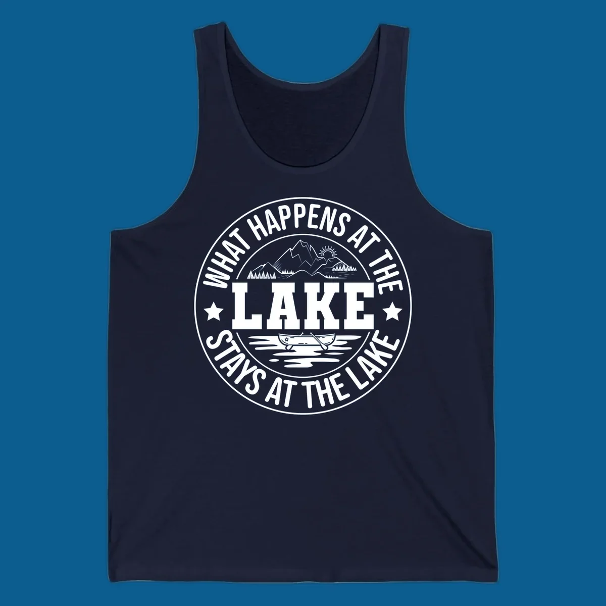 Circular badge with text 'What Happens At The Lake Stays At The Lake' and lake scene graphic.