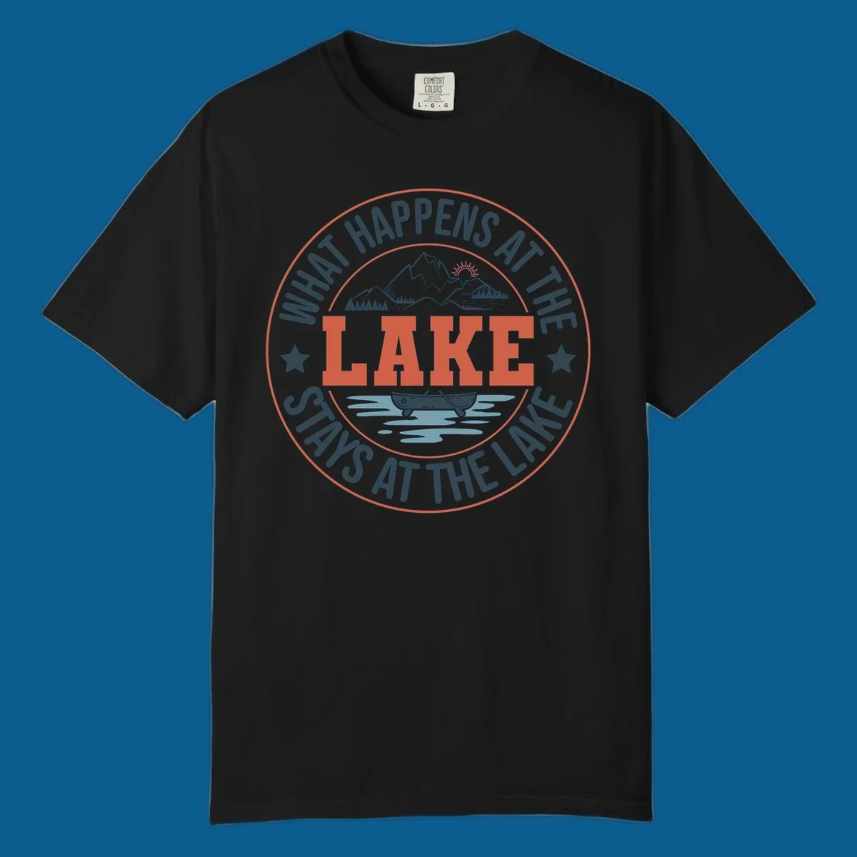 Circular badge design with "What Happens At The Lake Stays At The Lake" text and lake graphic.