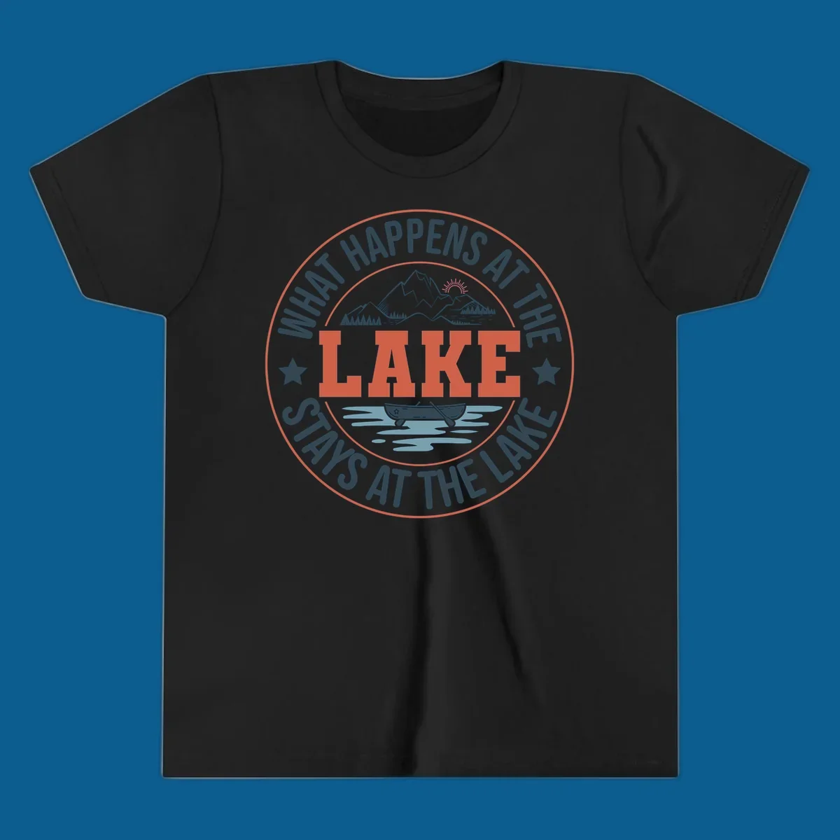 Circular badge design with "What Happens At The Lake Stays At The Lake" text and lake graphic.