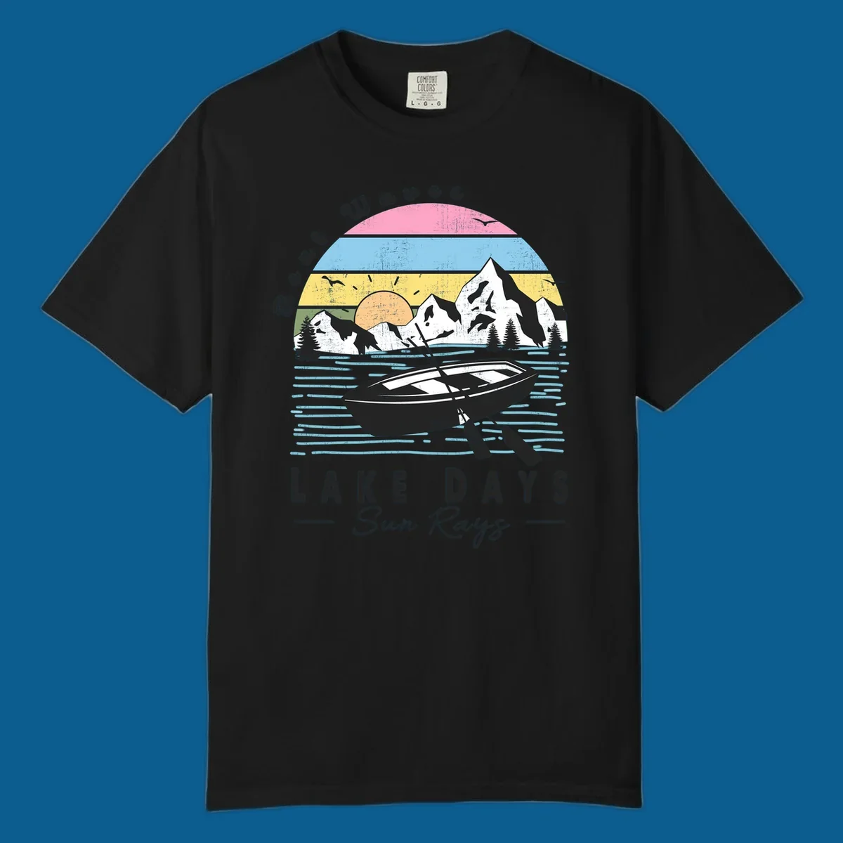 Vintage lake boat scenic design with mountains and sun, text reads Boat Waves, LAKE DAYS Sun Rays.