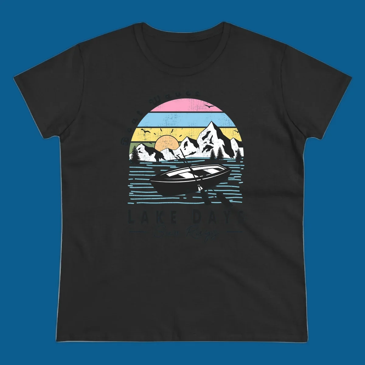 Vintage lake boat scenic design with mountains and sun, text reads Boat Waves, LAKE DAYS Sun Rays.