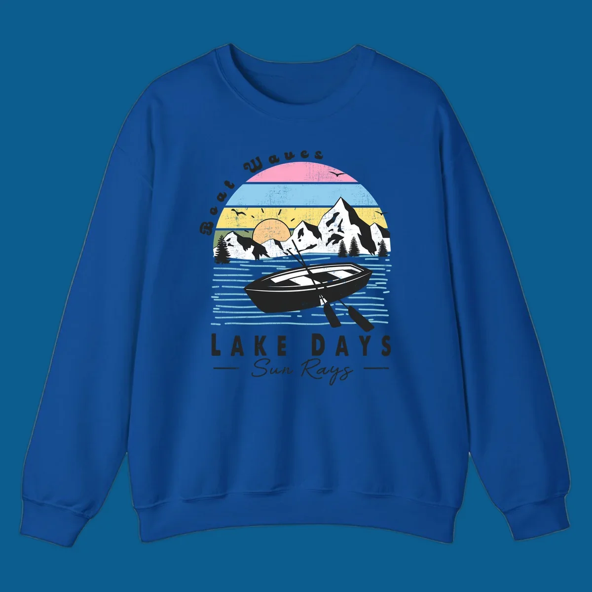 Vintage lake boat scenic design with mountains and sun, text reads Boat Waves, LAKE DAYS Sun Rays.