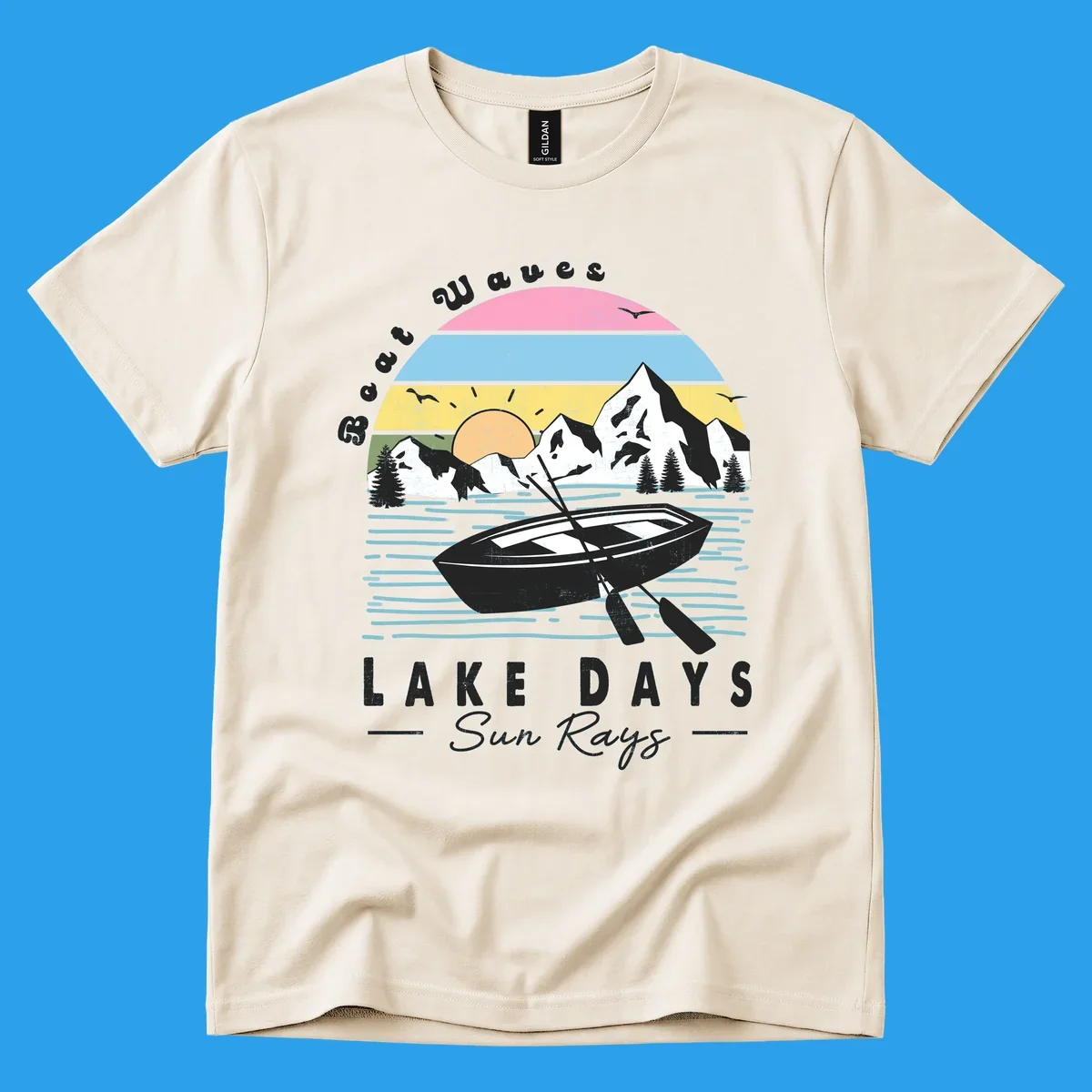 Vintage lake boat scenic design with mountains and sun, text reads Boat Waves, LAKE DAYS Sun Rays.