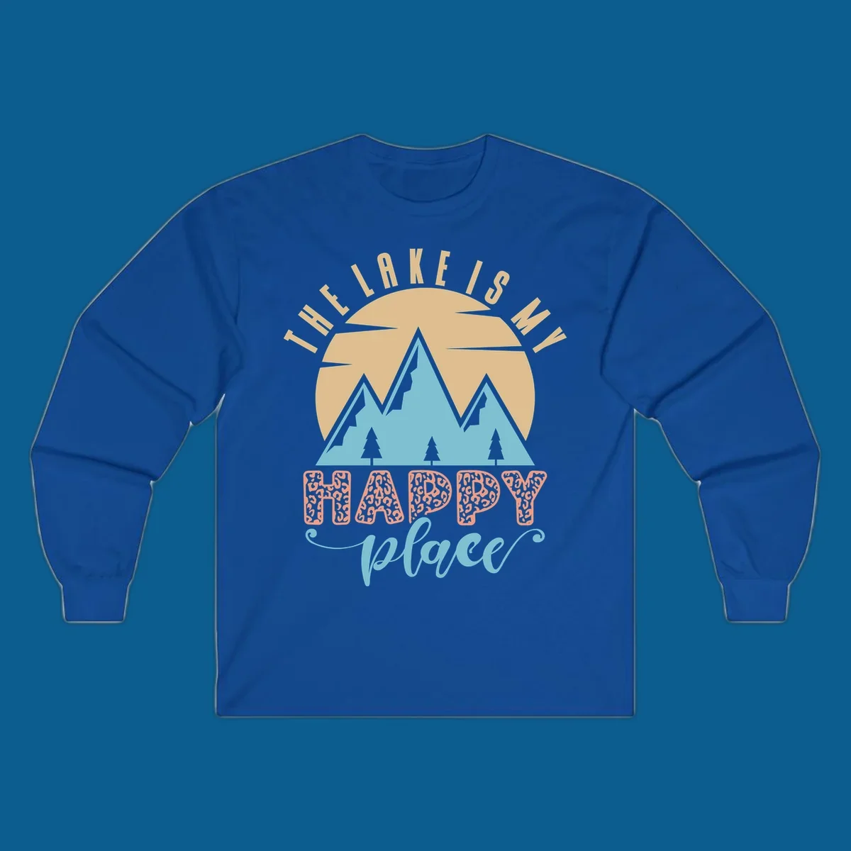 Illustration of mountains and sun with text 'The Lake Is My Happy Place' and leopard print.