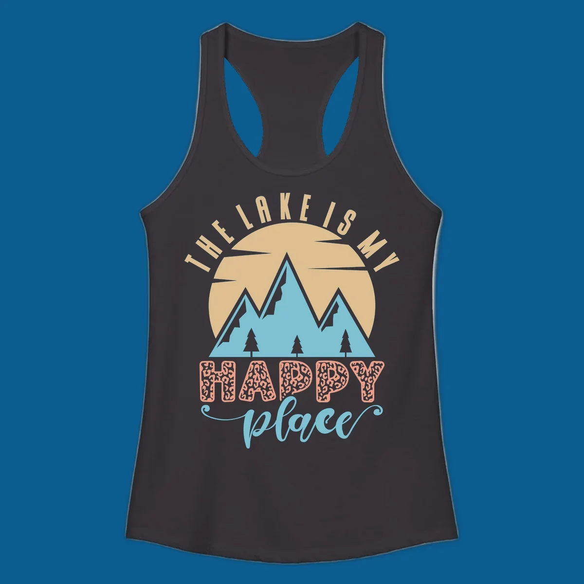 Illustration of mountains and sun with text 'The Lake Is My Happy Place' and leopard print.