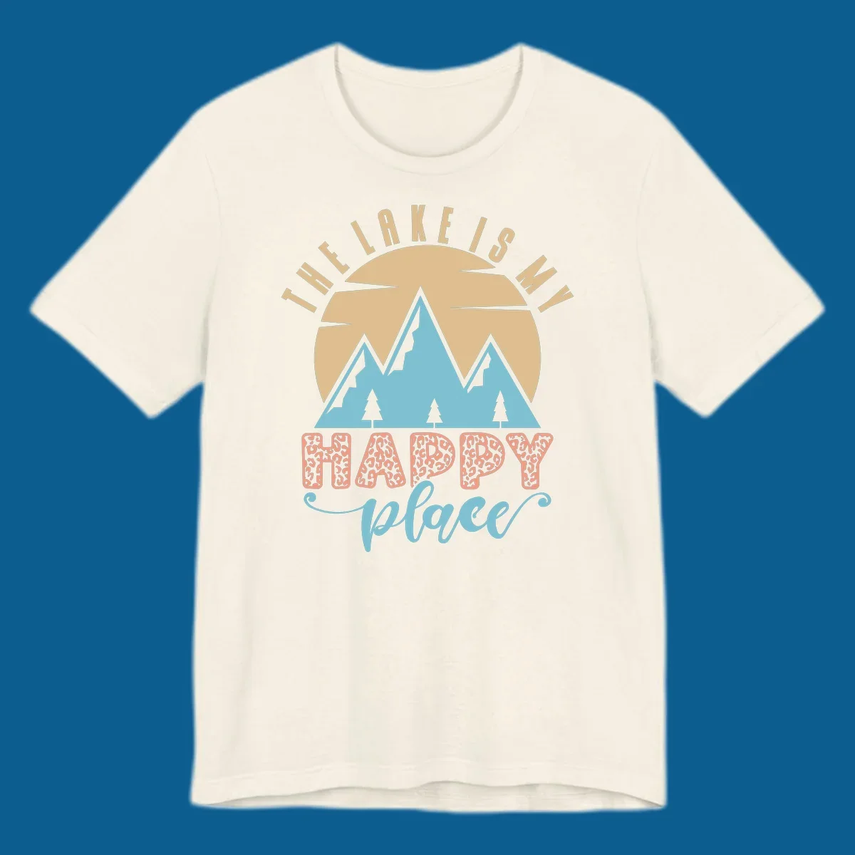 Illustration of mountains and sun with text 'The Lake Is My Happy Place' and leopard print.