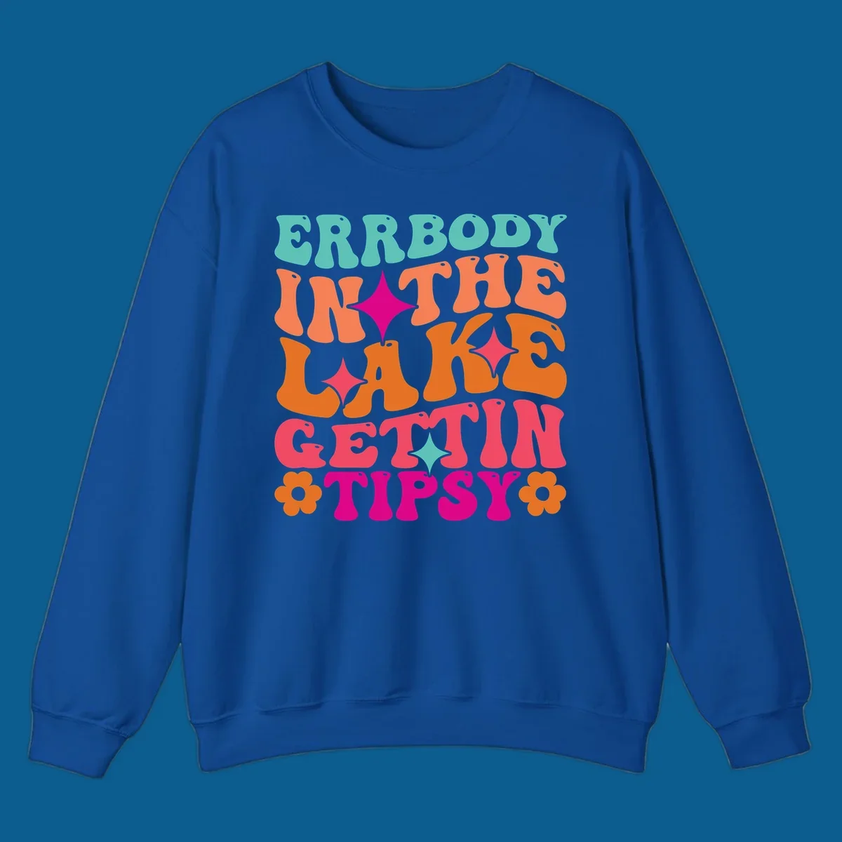 Retro groovy text design 'Errbody In The Lake Gettin Tipsy' with stars and flowers, lake-life-tipsy concept.