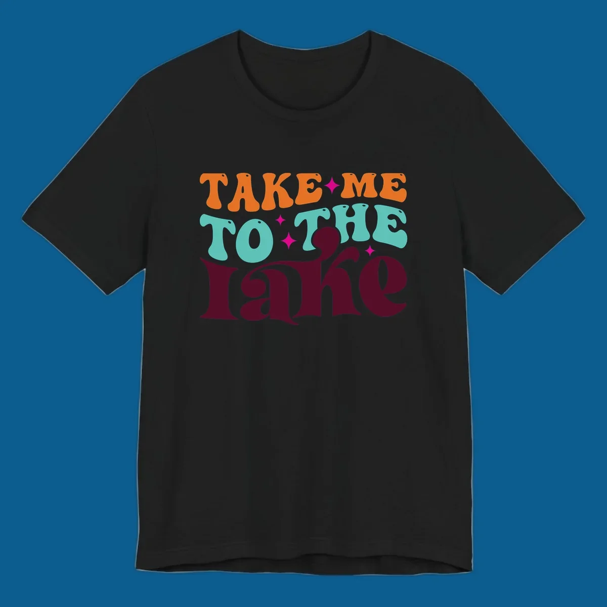 Retro typography design with the phrase 'TAKE ME TO THE lake' in orange, teal, and purple.