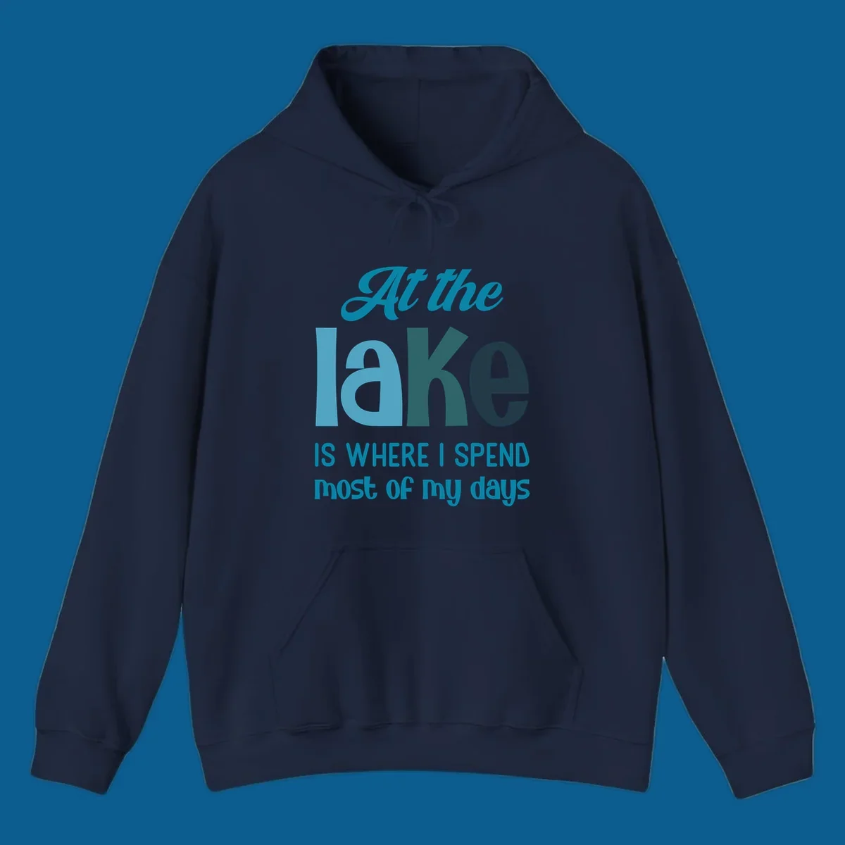 Typography design with the phrase "At the lake is where I spend most of my days".