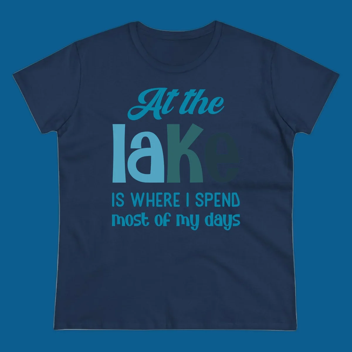 Typography design with the phrase "At the lake is where I spend most of my days".