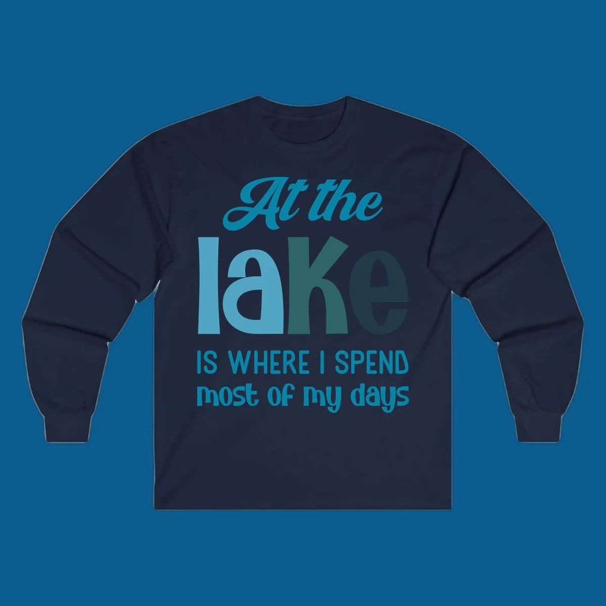 Typography design with the phrase "At the lake is where I spend most of my days".