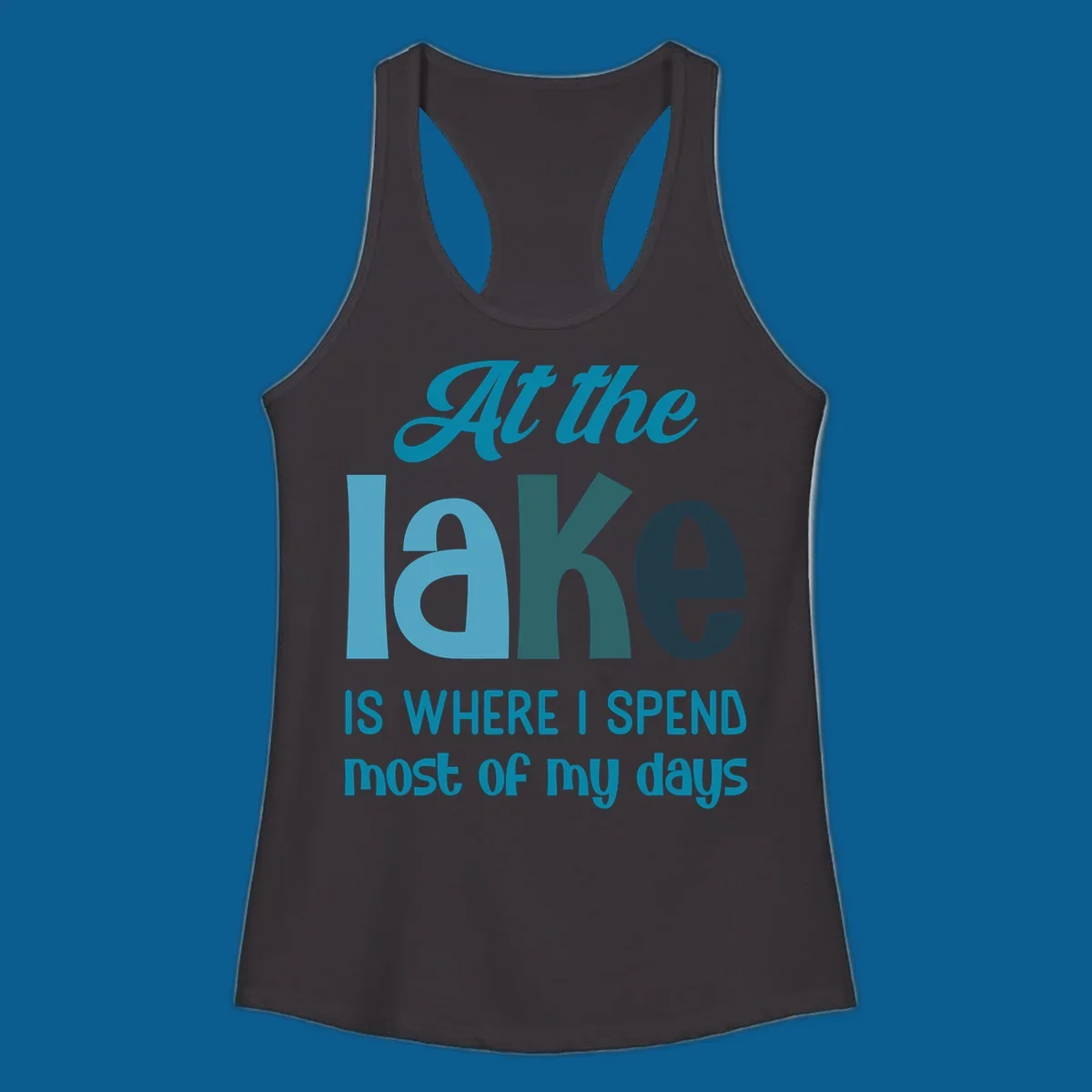 Typography design with the phrase "At the lake is where I spend most of my days".