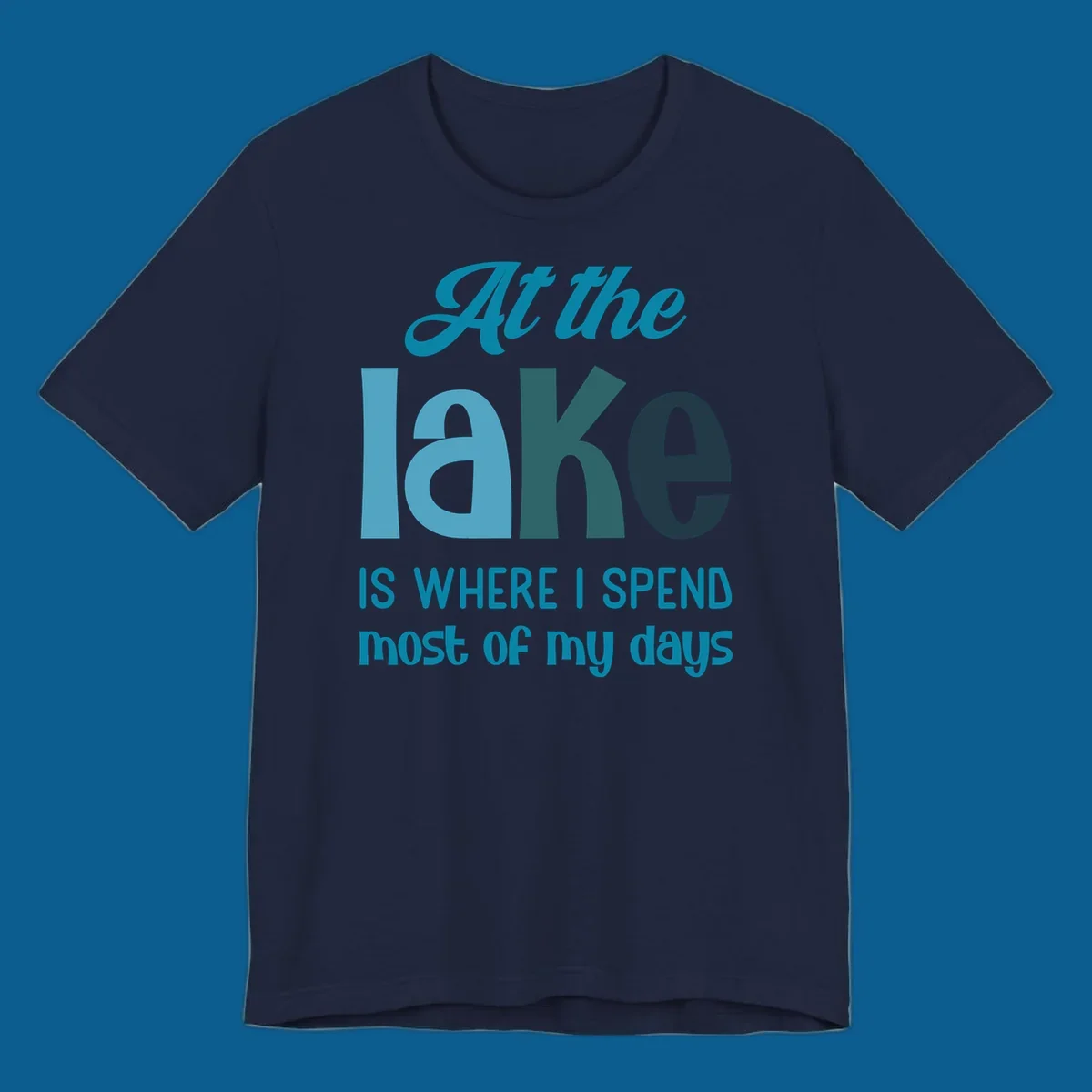 Typography design with the phrase "At the lake is where I spend most of my days".