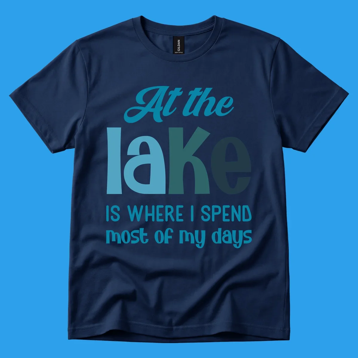 Typography design with the phrase "At the lake is where I spend most of my days".