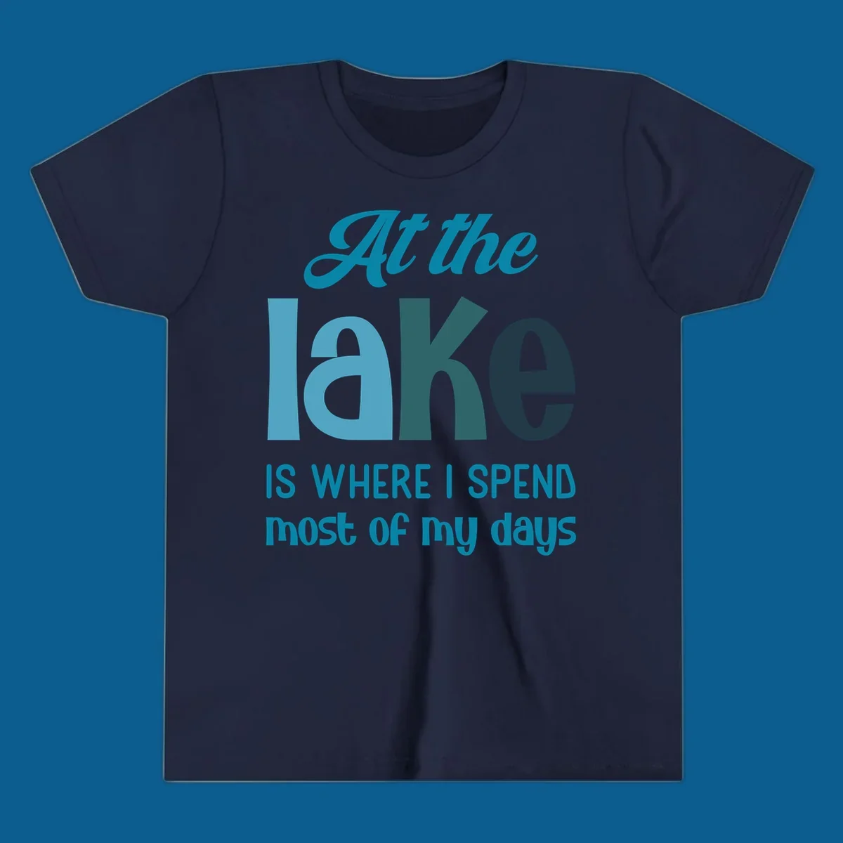 Typography design with the phrase "At the lake is where I spend most of my days".
