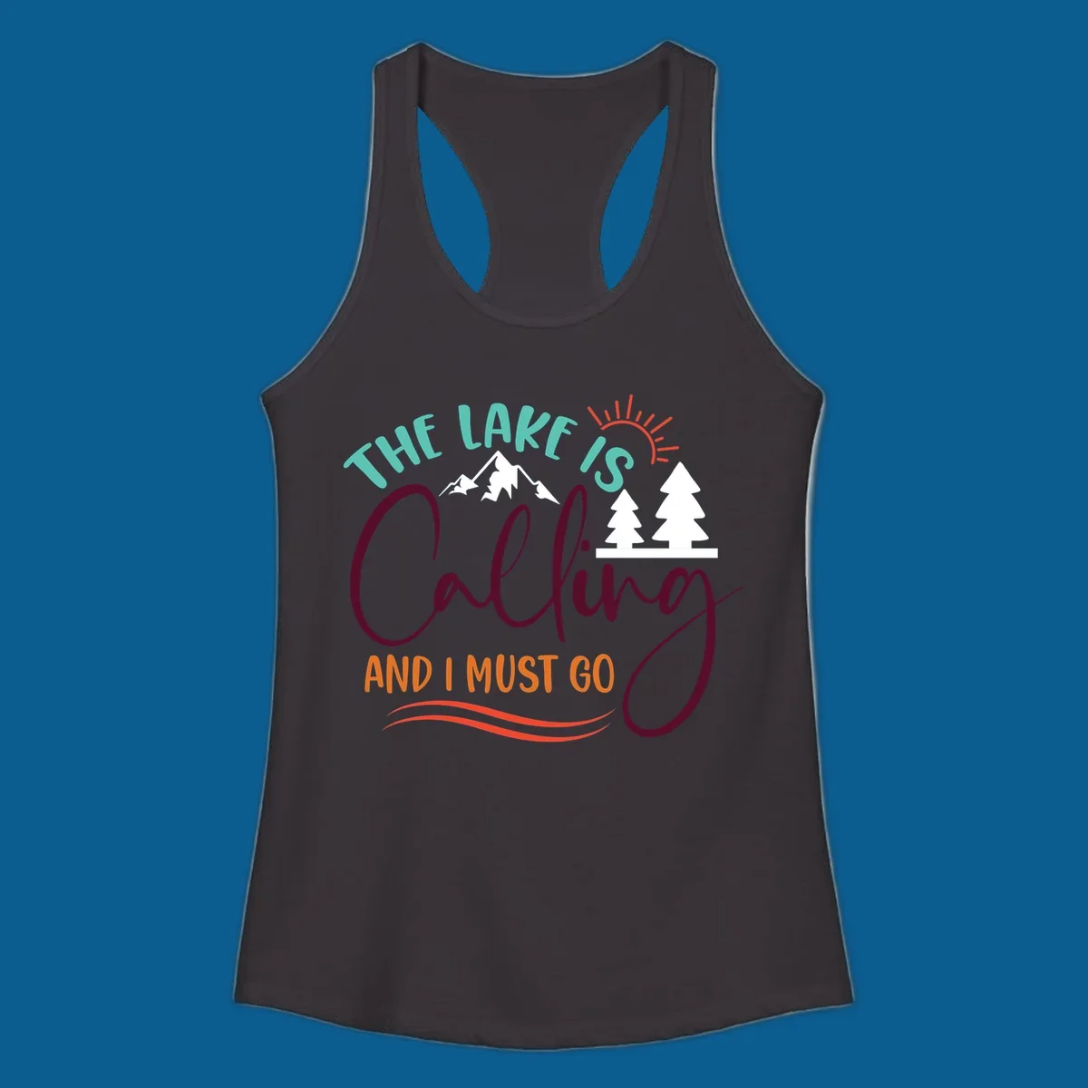 The Lake Is Calling And I Must Go nature graphic with mountains, trees, and sun rays.