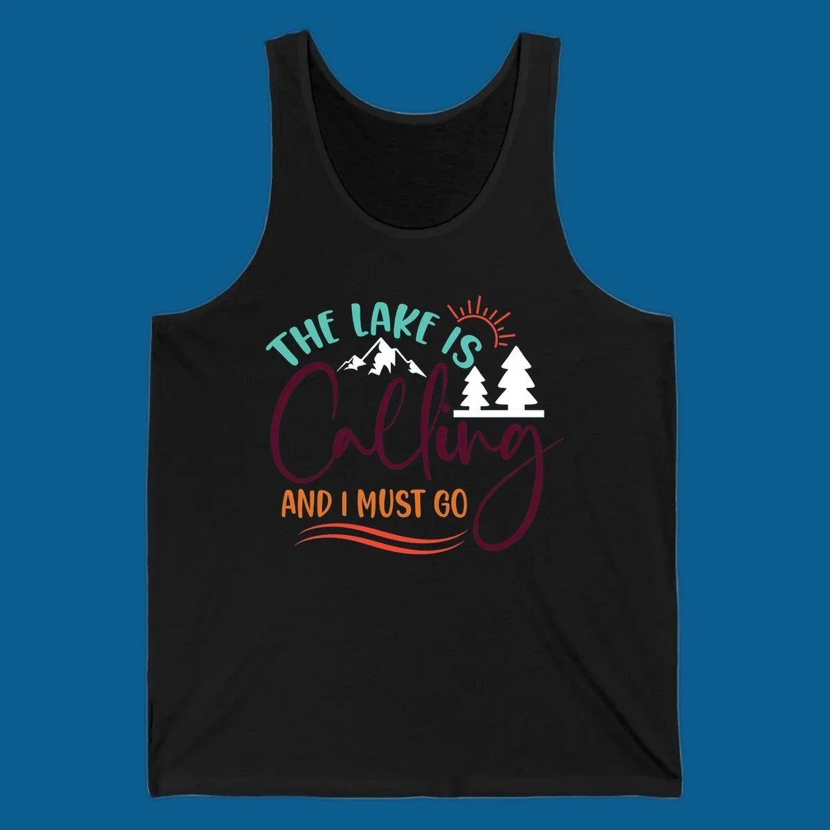 The Lake Is Calling And I Must Go nature graphic with mountains, trees, and sun rays.