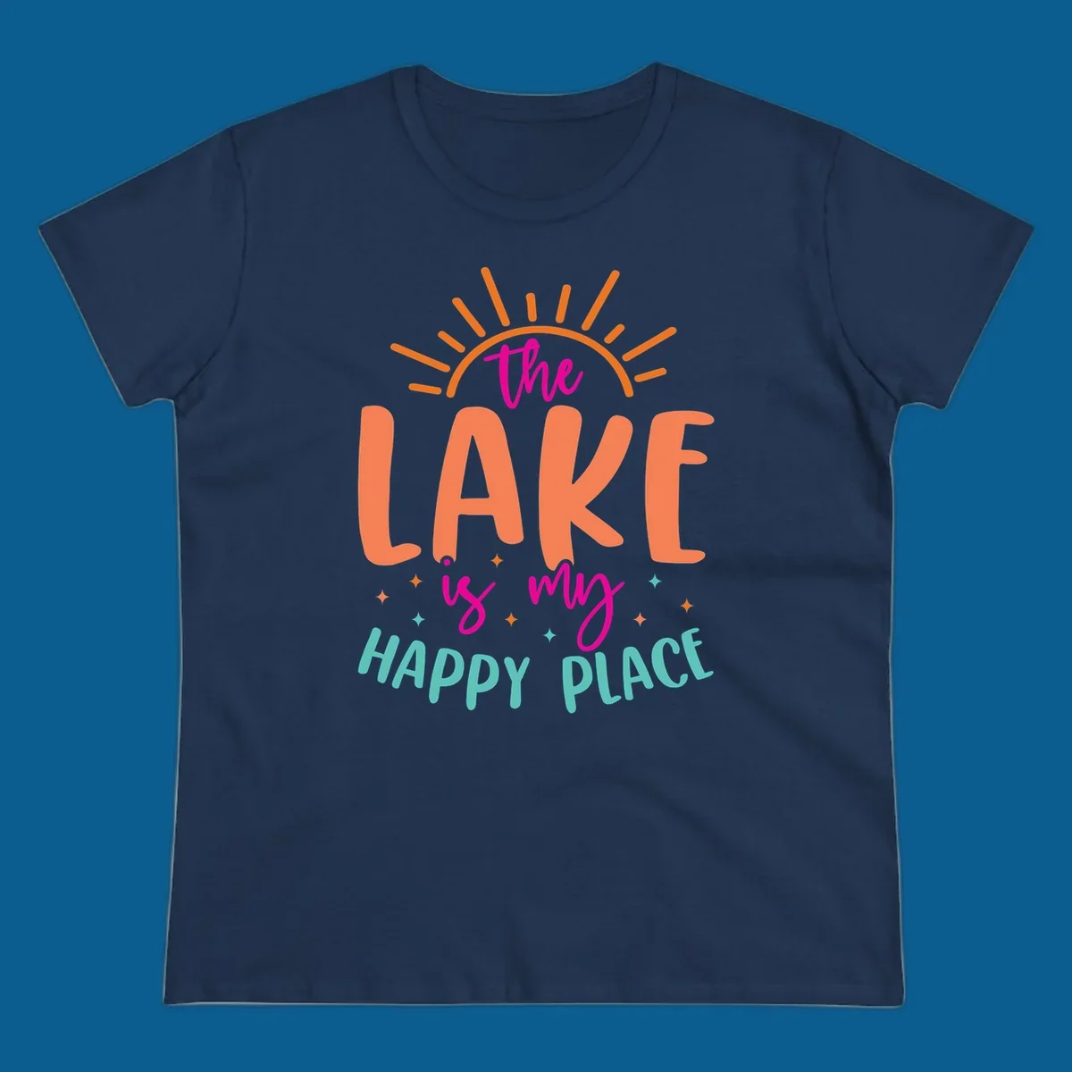 The lake is my happy place text design with sun rays and stars.