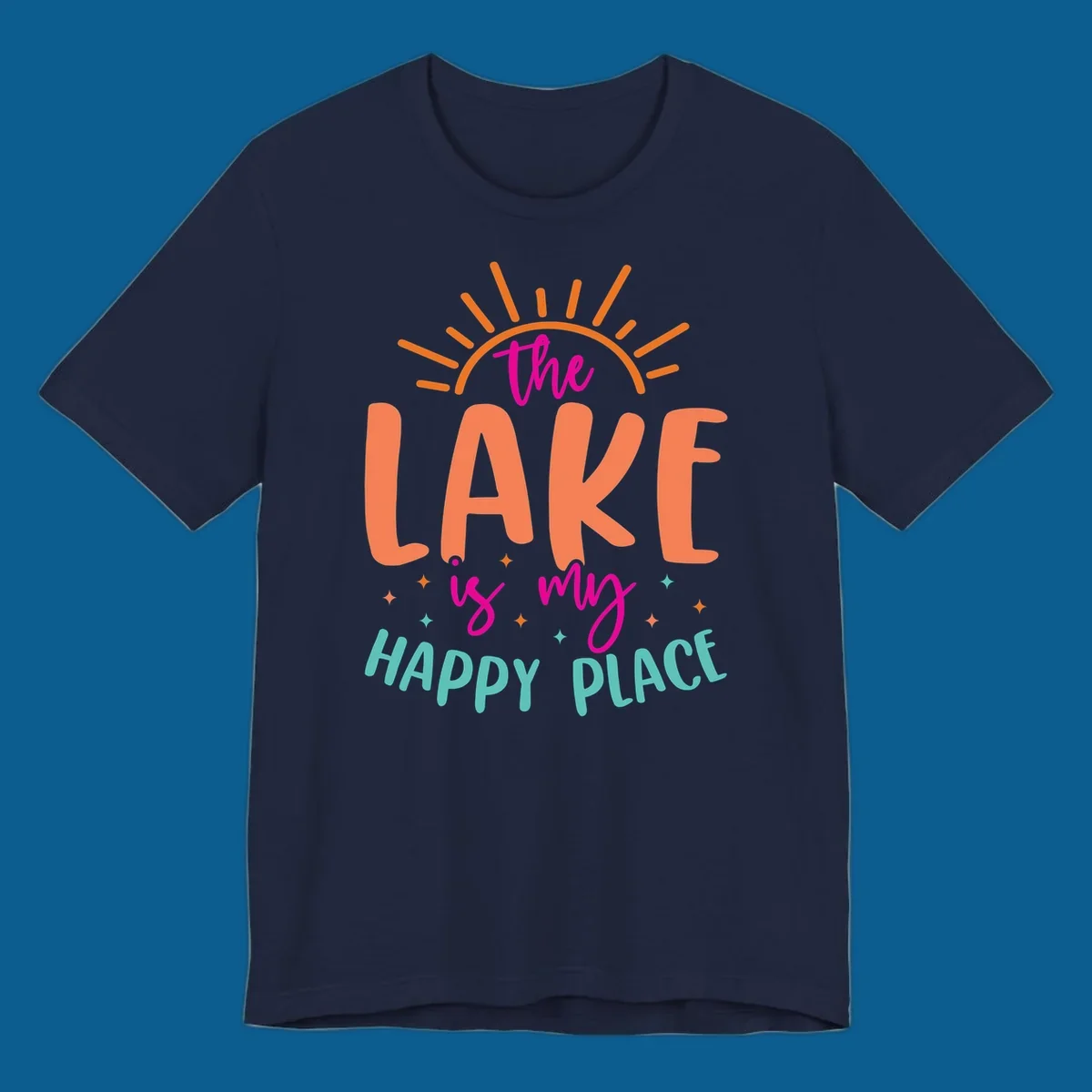 The lake is my happy place text design with sun rays and stars.