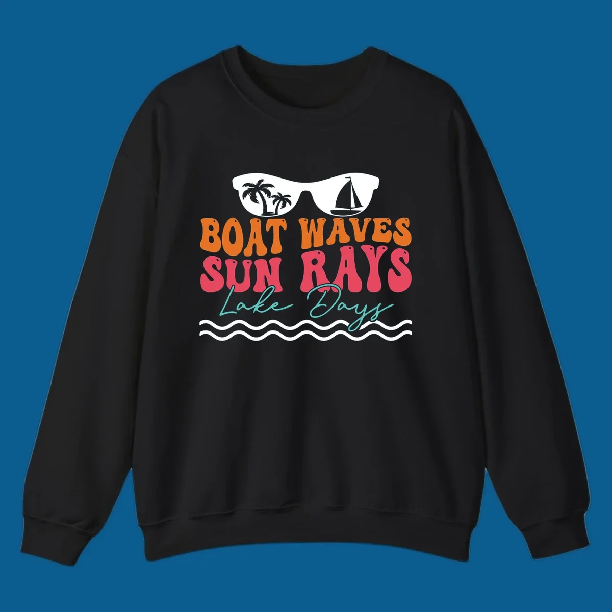 Retro sunglasses reflecting palm trees and sailboat above text "BOAT WAVES SUN RAYS Lake Days" for lake life.