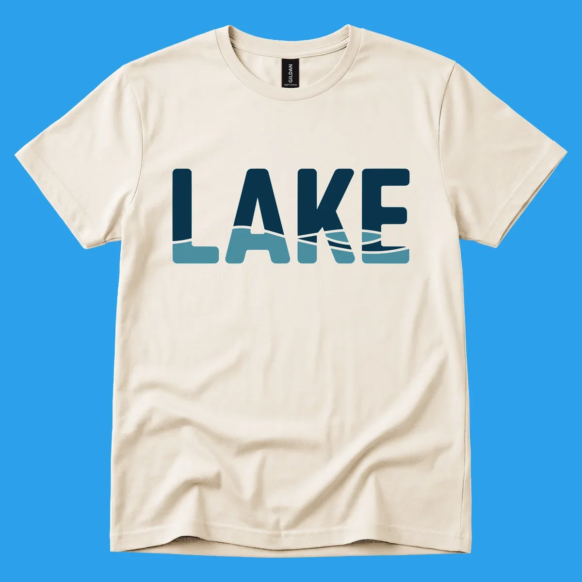 Lake Life Shirt Co. logo with the word LAKE in dark blue with light blue water graphics at the bottom.