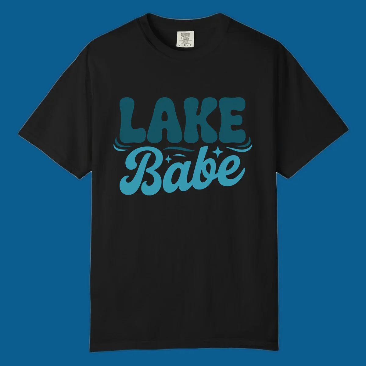 Retro LAKE Babe text design with wavy font and sparkle accents.