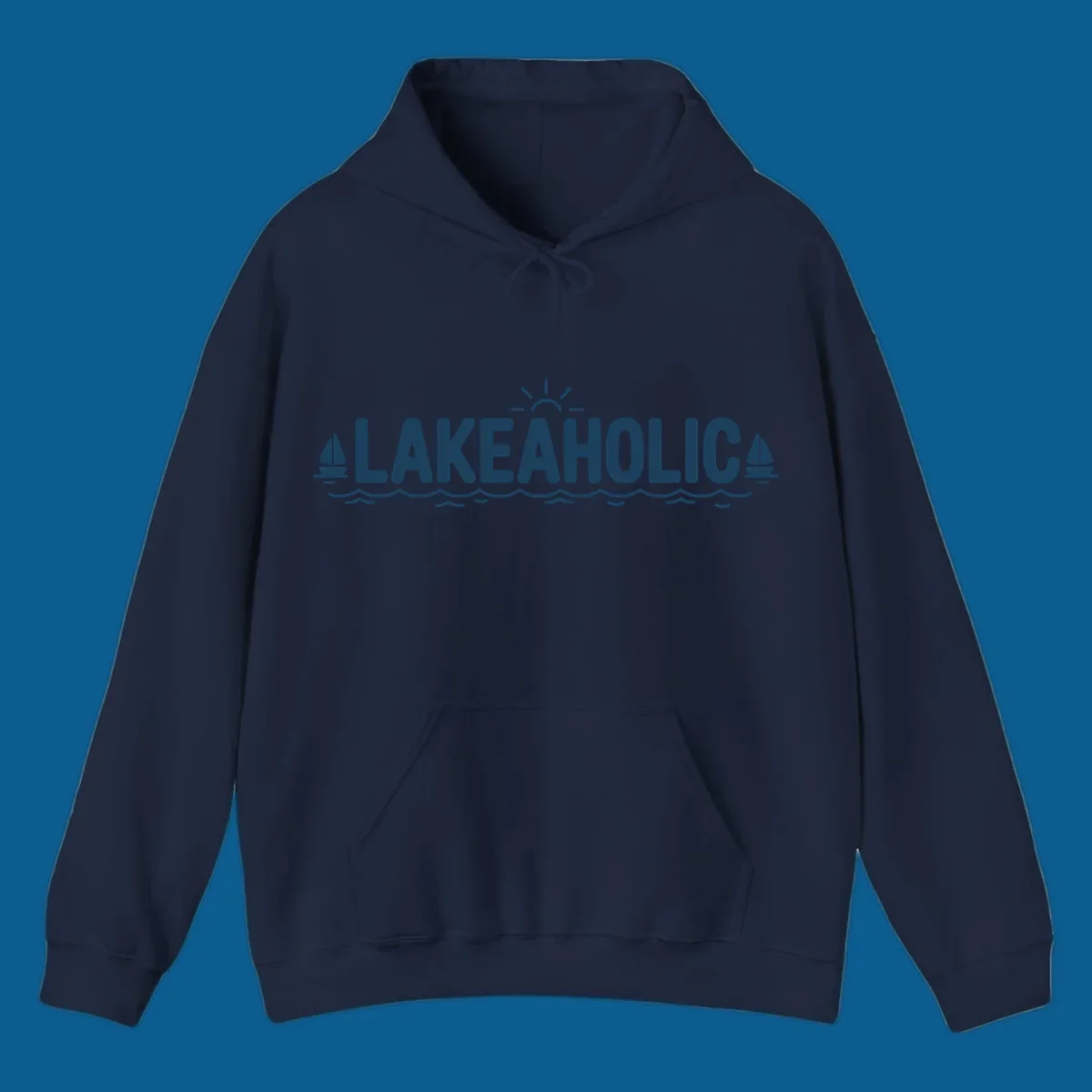 Lakeaholic typography with sun, sailboats, and waves graphic.