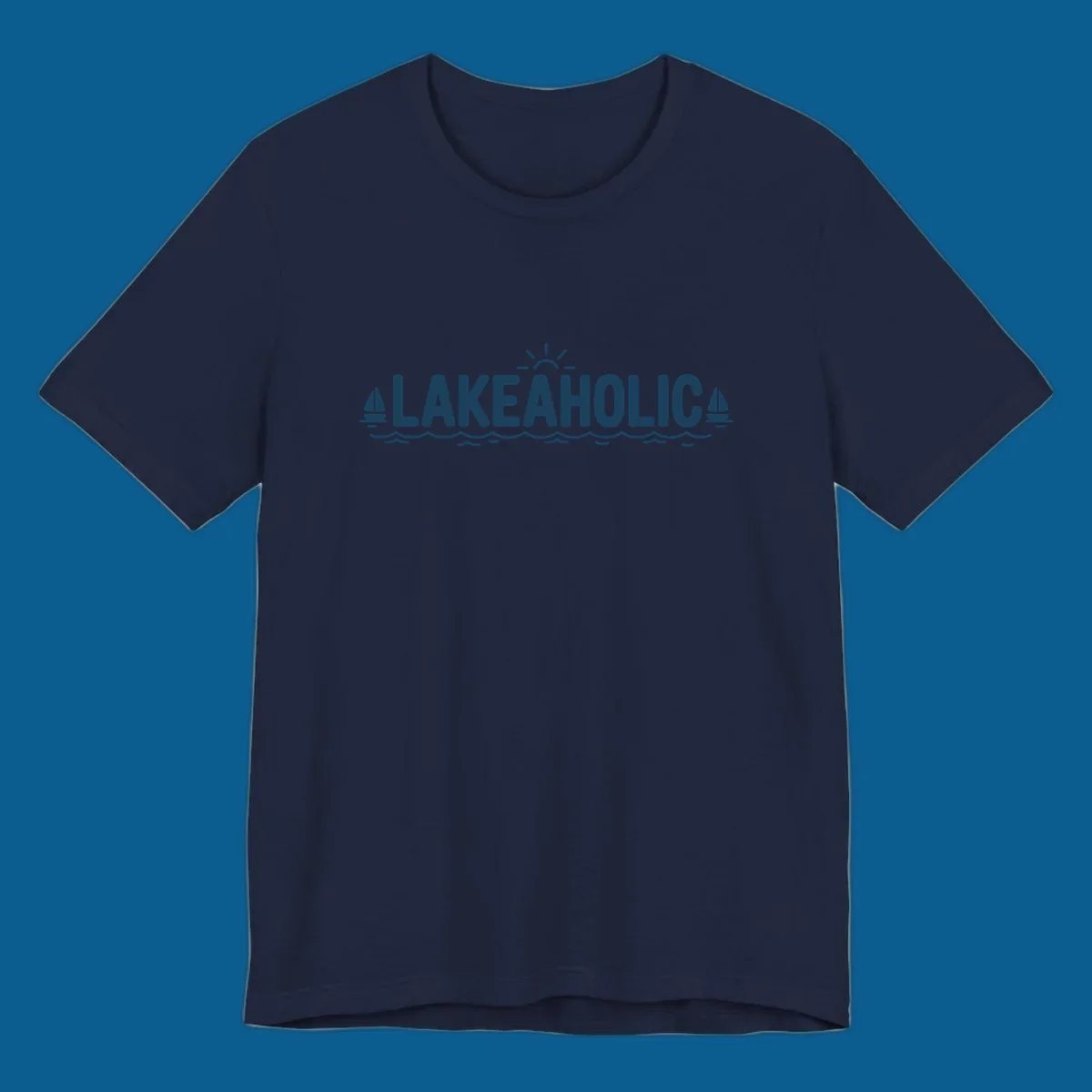 Lakeaholic typography with sun, sailboats, and waves graphic.