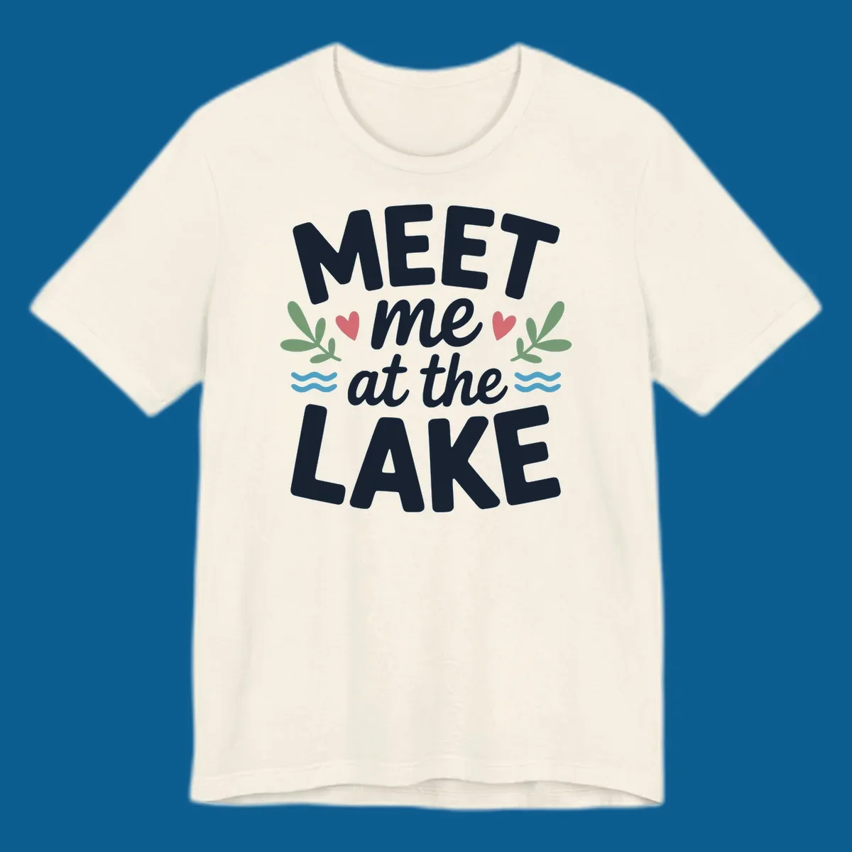 Meet me at the lake typography design with hearts, leaves, and waves.