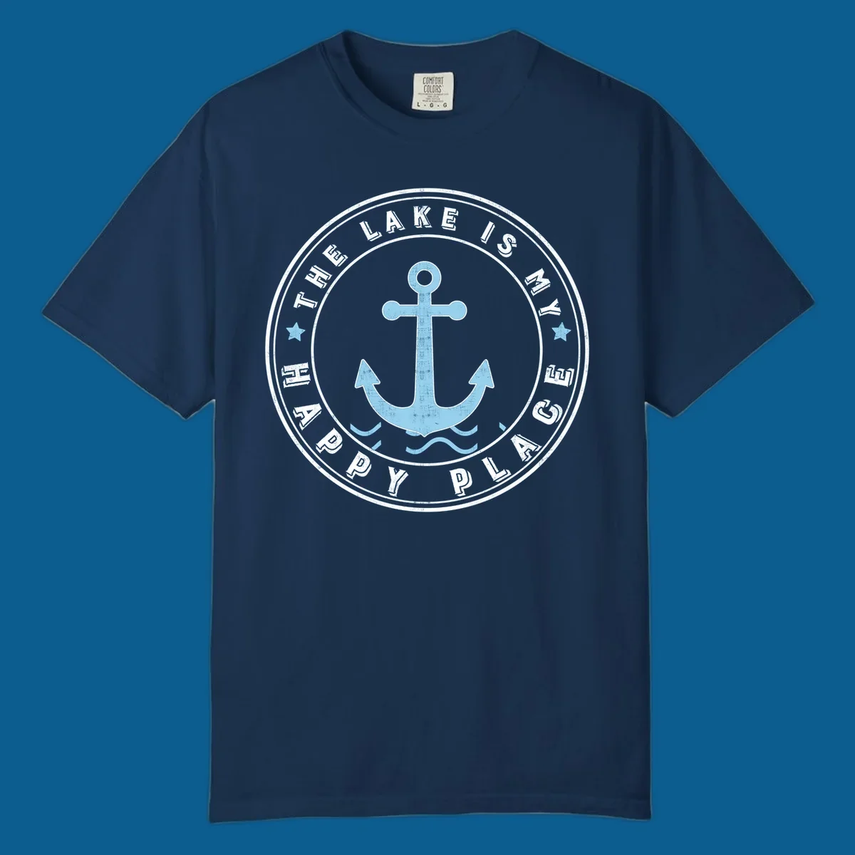 Circular badge with anchor and text 'The Lake Is My Happy Place', lake-happy-place concept.