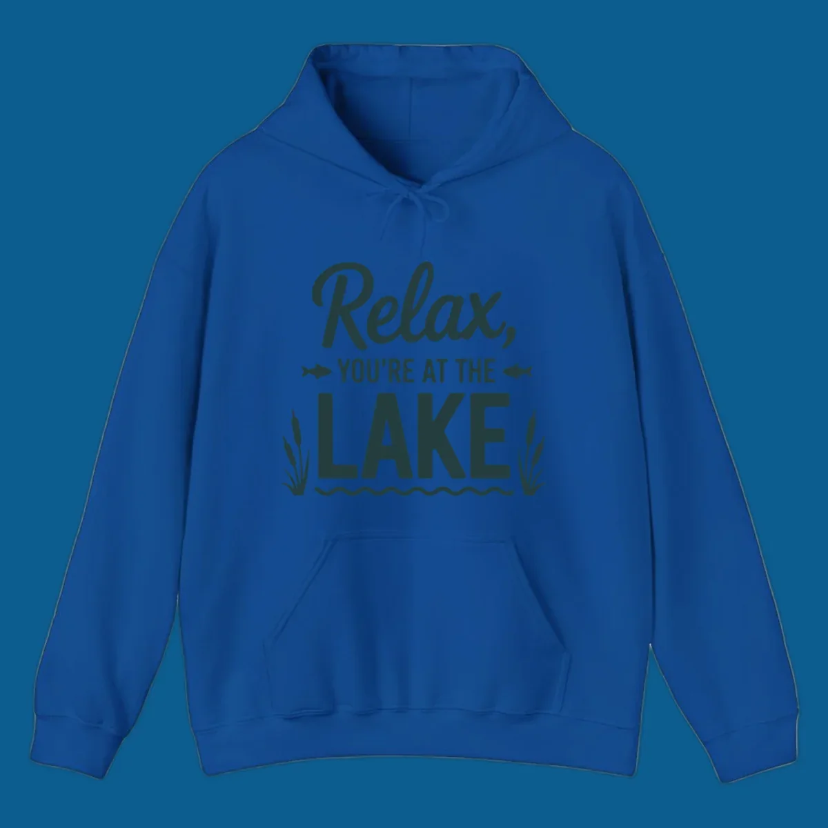 Relax you're at the lake typographic design with fish and cattails.