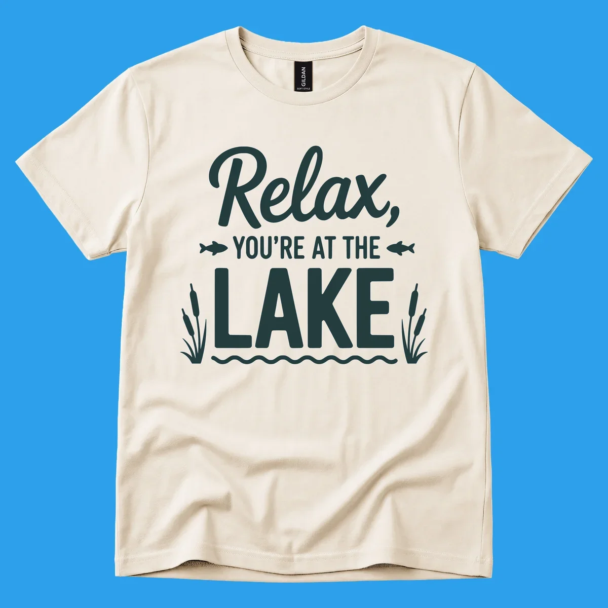 Relax you're at the lake typographic design with fish and cattails.