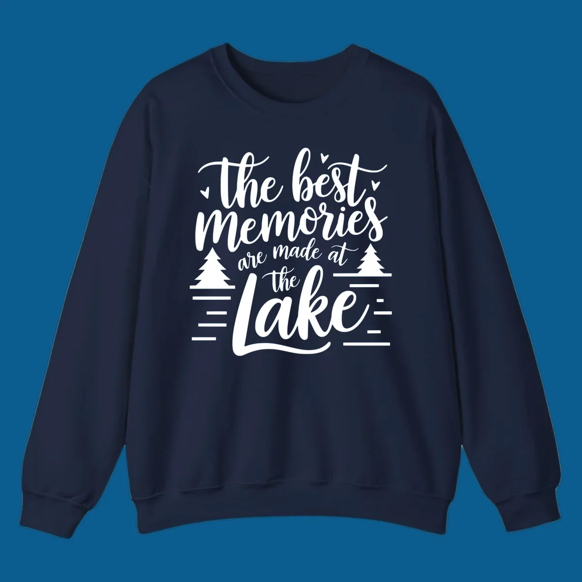 The best memories are made at the lake text with trees and water lines for lake life memories.