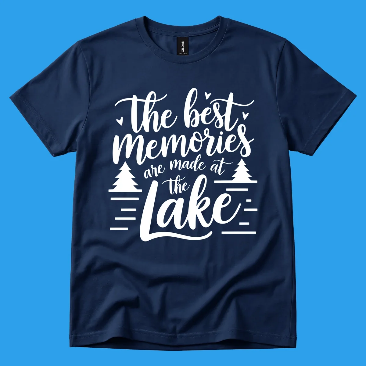 The best memories are made at the lake text with trees and water lines for lake life memories.