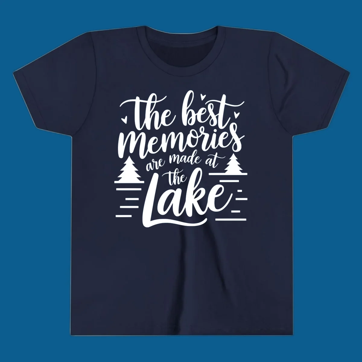 The best memories are made at the lake text with trees and water lines for lake life memories.