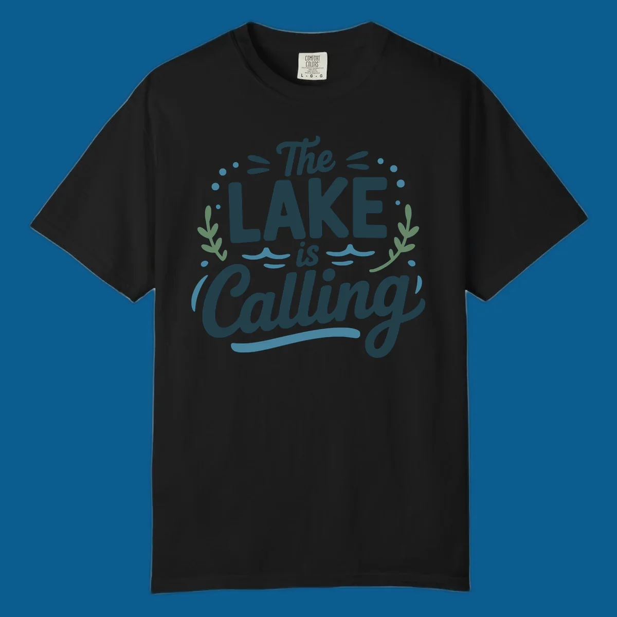 The Lake Is Calling text design with wave and leaf graphics