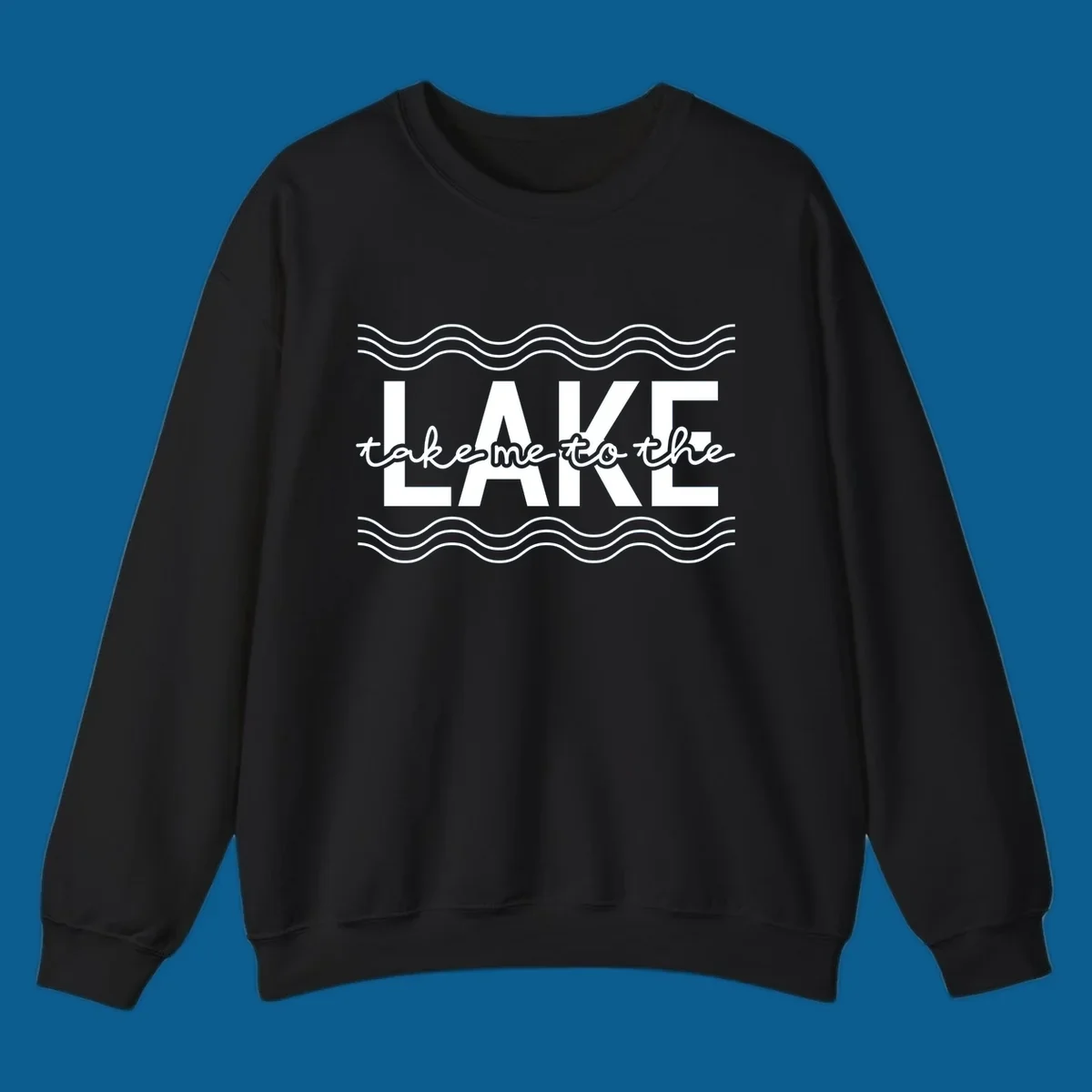 Lake life typography design with text 'take me to the LAKE' and wavy lines.